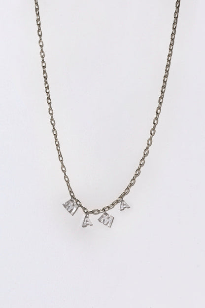 A silver chain with white diamond letter spelling out 'MAMA' on a white background