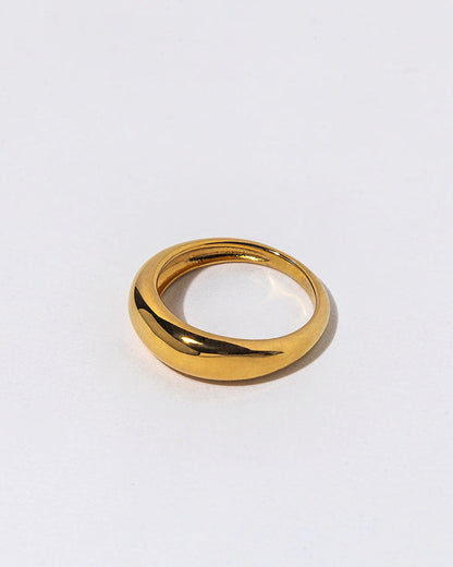 Gold ring on a white background