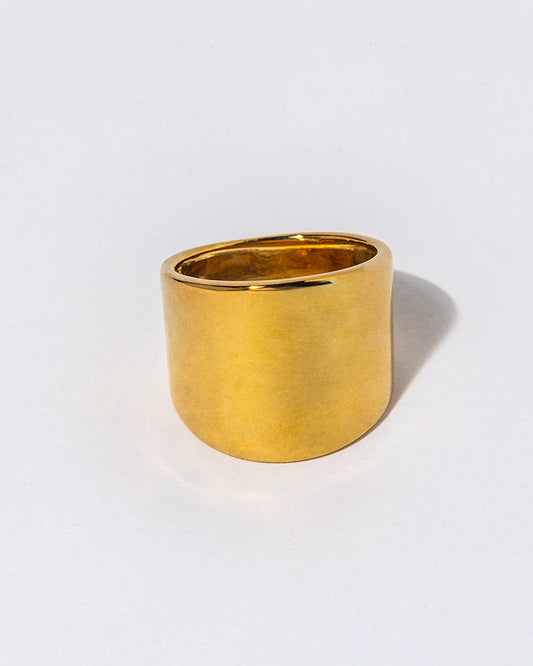 Gold ring on a white background